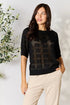 Pear Daisy Mandy ribbed trim round neck knit top, stylish and comfortable, shown in a cozy home setting.