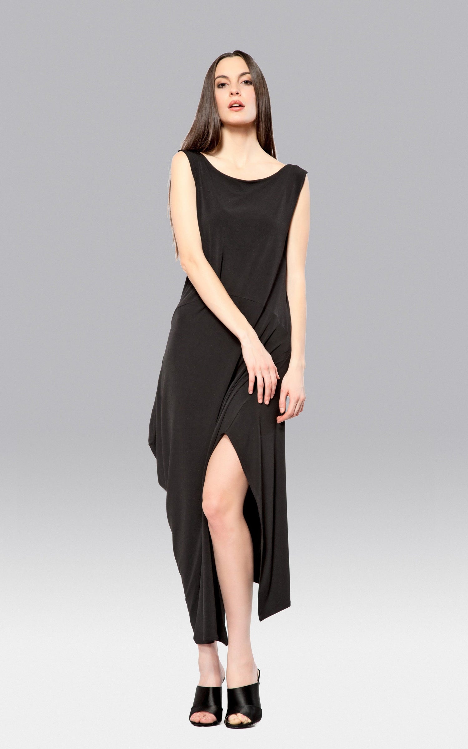 Black angled dress for women by Purple Mango, showcasing a stylish cut and elegant fit in a fashion-forward design.