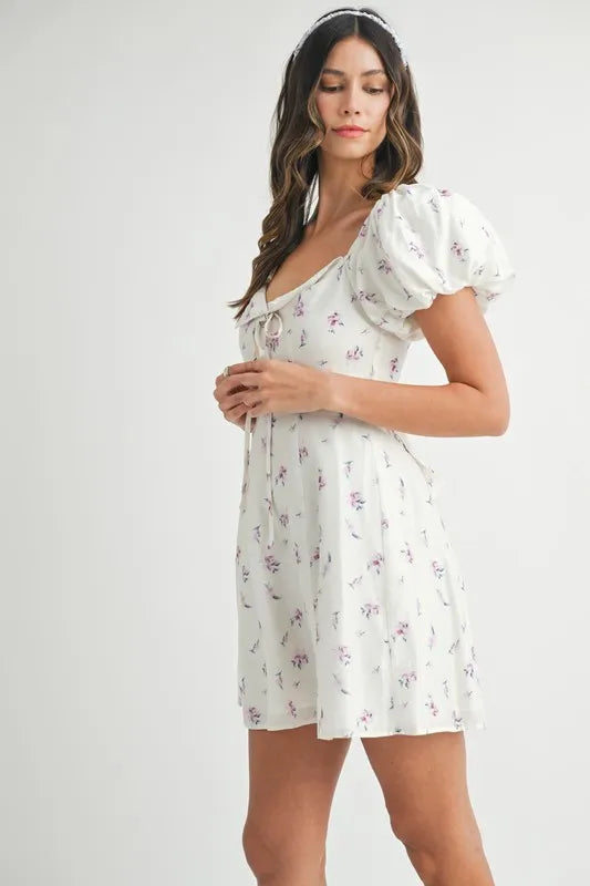 Pear Daisy floral print puff sleeve mini dress with a stylish design, perfect for casual wear and garden outings.
