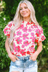 Beige floral puff sleeve blouse with frilled neckline by Carmine Juneberry, featuring a stylish and feminine design.