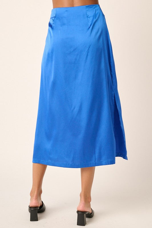 Jade Icarus Mittoshop satin midi skirt with side slit, flowing fabric, stylish design, shown on a model.