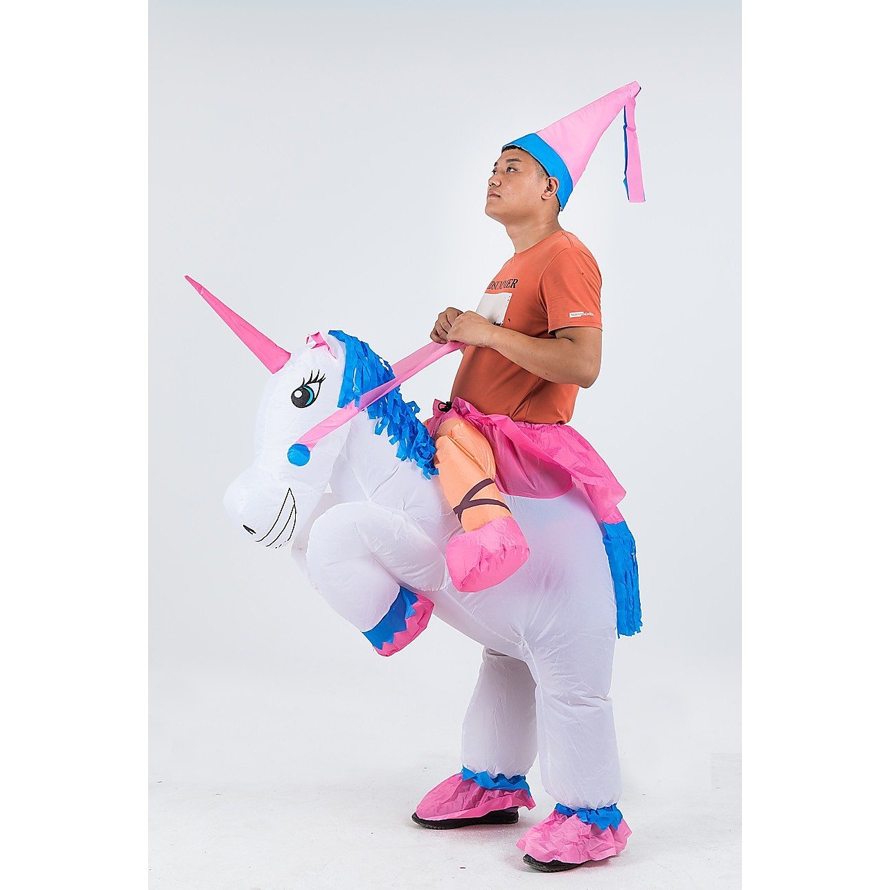 Magenta Danae unicorn inflatable costume with fan operated design, ideal for home and garden dress-up and parties.