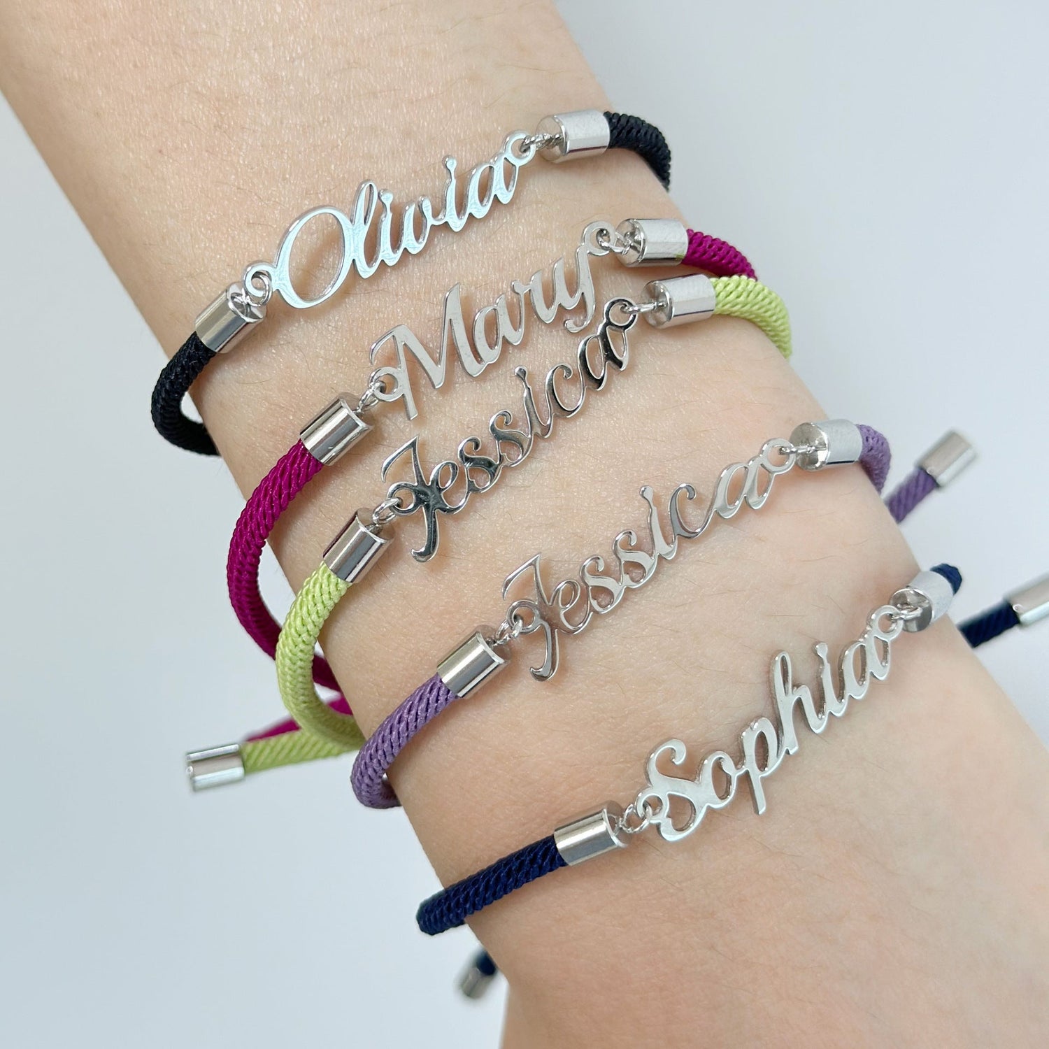 Colorful personalized rope chain bracelet with custom name, designed for women by Pink Lucky, featuring vibrant woven details.