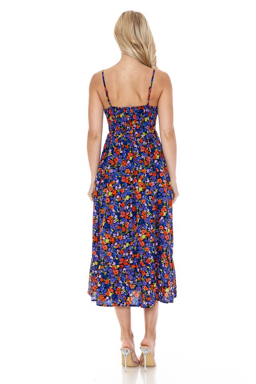 Women’s floral maxi dress by Jade Icarus featuring a flowing fabric and vibrant floral pattern, perfect for summer or casual wear.