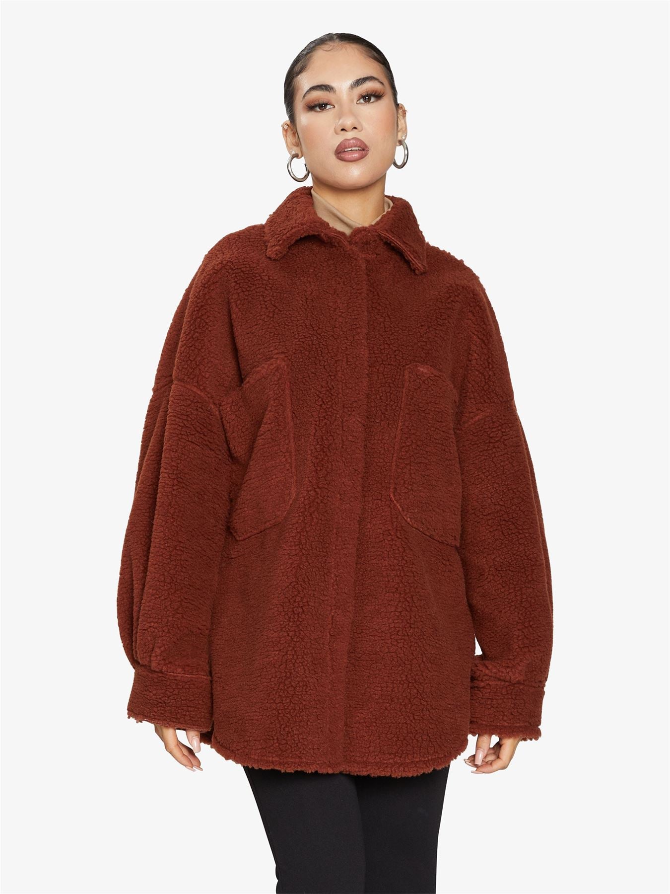 Rose Eleusis oversized patch pocket borg teddy shacket with a cozy, plush fleece exterior and relaxed fit, ideal for layering.