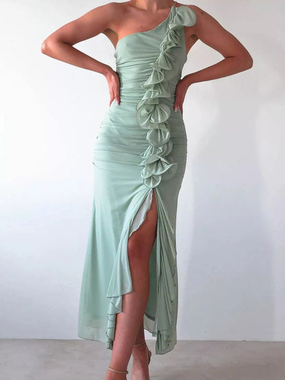 Jade Iapetus stylish one-shoulder ruffle slit dress displayed on a model, featuring elegant ruffle details and a sleek silhouette.