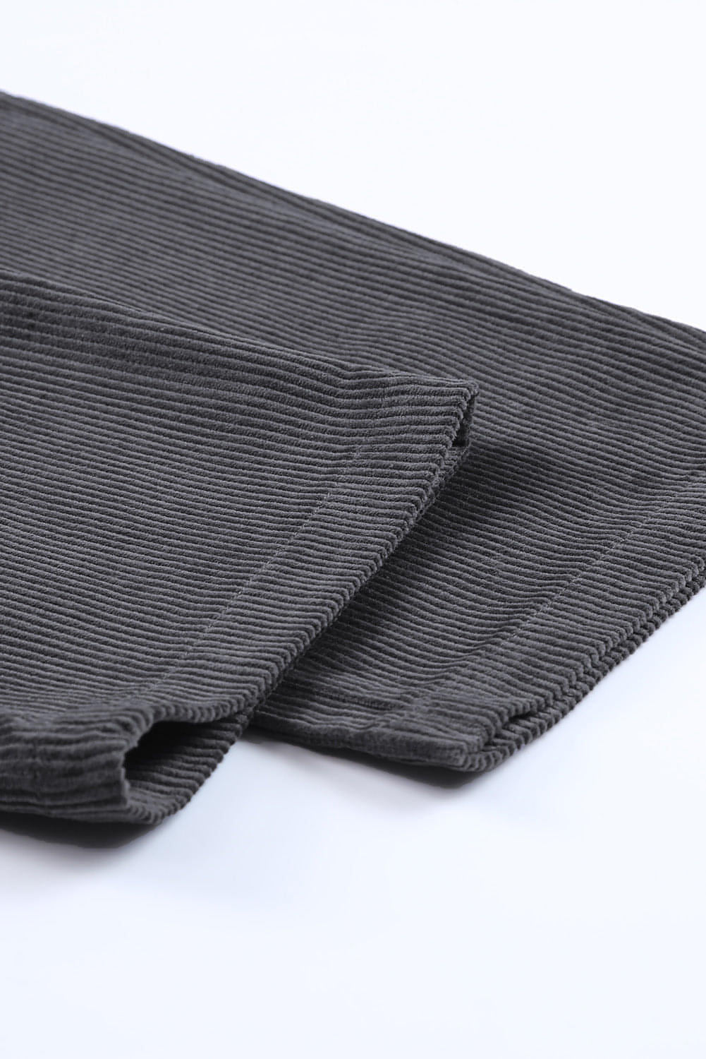 Gray corduroy high waist straight leg pants by Carmine Juneberry, shown with a close-up of the textured fabric and classic fit.
