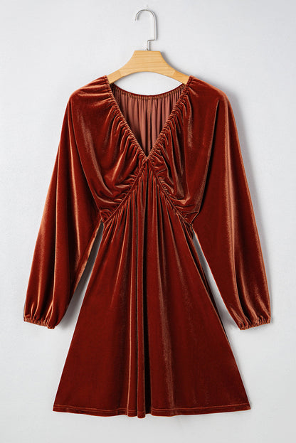 Velvet elastic V-neck puff sleeve mini dress by Byzantium Bay, featuring a fitted waist and stylish puff sleeves.