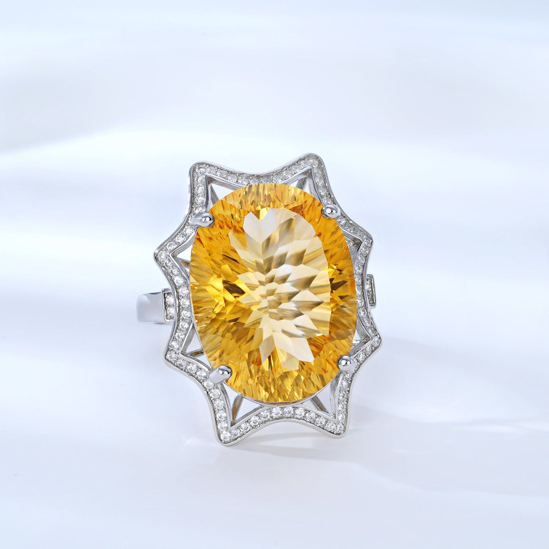 Women’s large citrine ring by Carmine Juneberry featuring a simple, natural design with a prominent yellow citrine gemstone.