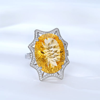Women’s large citrine ring by Carmine Juneberry featuring a simple, natural design with a prominent yellow citrine gemstone.