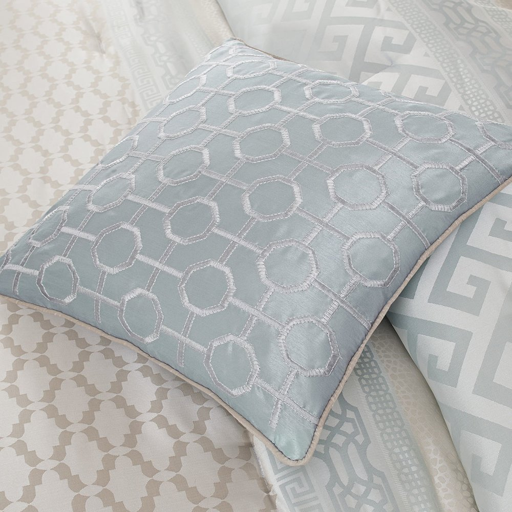 Start2Finish 7-piece comforter set featuring a cozy, patterned bedding arrangement with pillows and matching bedspread.