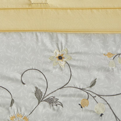 Start2Finish embroidered 7-piece comforter set with detailed floral embroidery and matching pillow shams on a neatly made bed.