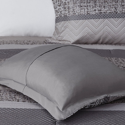 Start2Finish 7-piece Jacquard comforter set featuring a detailed woven pattern and coordinating pillow shams for a stylish bedroom look.