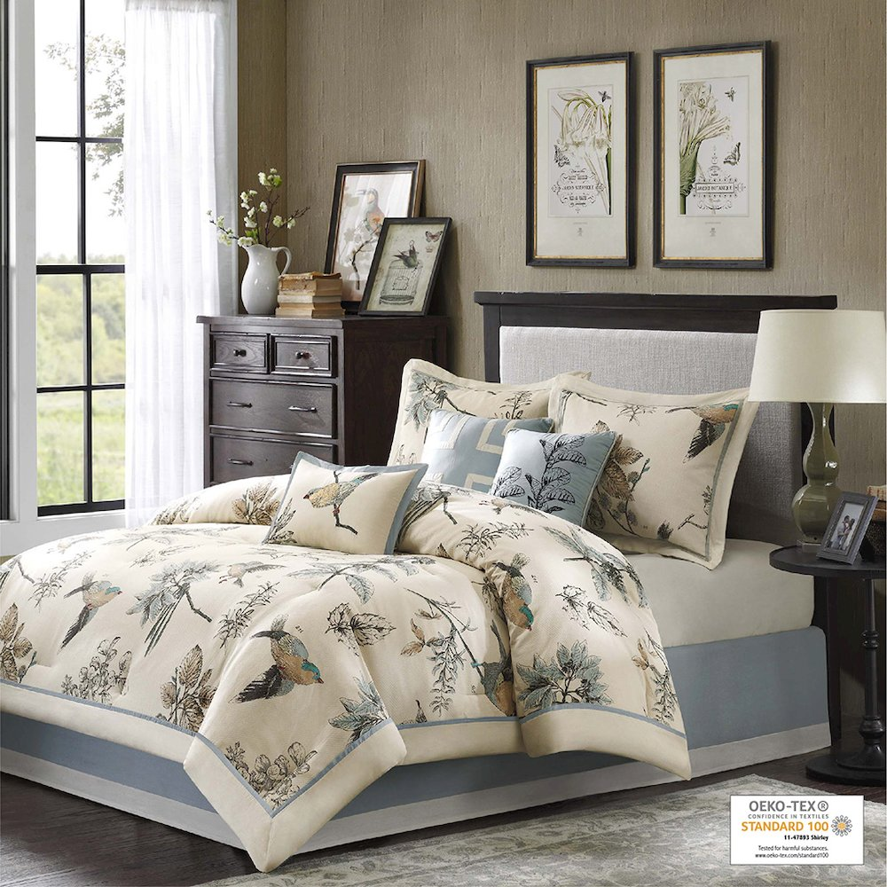 Start2Finish 7-piece comforter bedding set with coordinated pillow shams and decorative pillows on a neatly made bed.