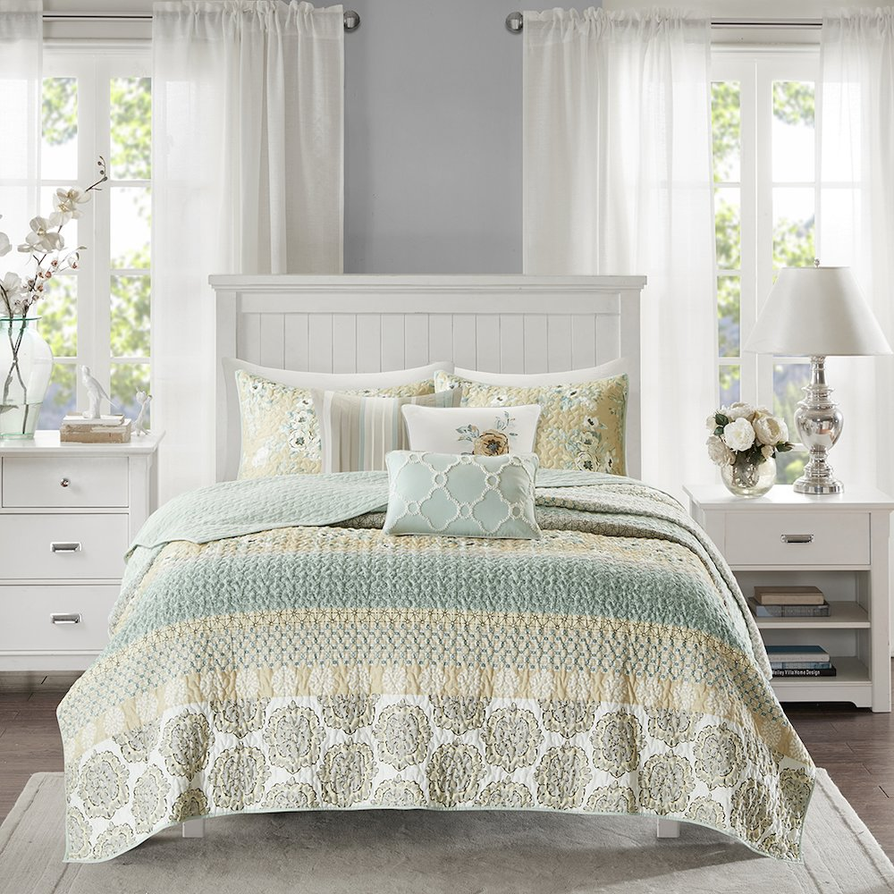 Start2Finish 6-piece cotton quilt set with matching throw pillows, featuring a cozy, stylish bedding ensemble in neutral tones.