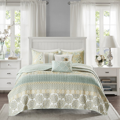 Start2Finish 6-piece cotton quilt set with matching throw pillows, featuring a cozy, stylish bedding ensemble in neutral tones.