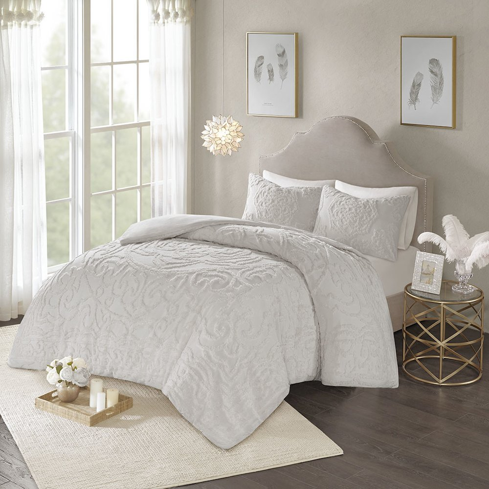 Three-piece tufted cotton chenille medallion duvet cover bedding set with matching pillow shams, in elegant neutral tones.