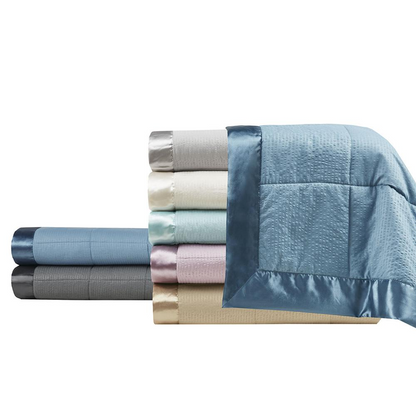 Oversized Start2Finish down alternative bedding blanket with satin trim, soft and plush for cozy comfort.
