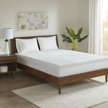 Start2Finish mattress topper shown on bed, plush and cushioned for added comfort and support during sleep.