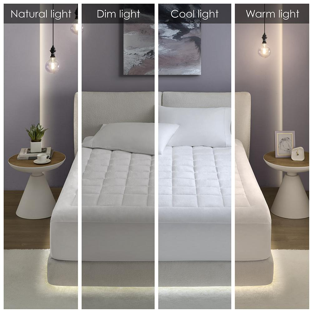 Overfilled hypoallergenic waterproof mattress pad by Start2Finish with plush down alternative filling and soft fabric surface.