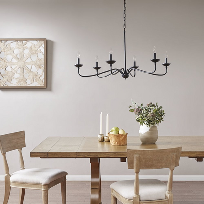 Six-light farmhouse metal chandelier with black finish and Edison-style bulbs, ideal for rustic or farmhouse-style lighting.