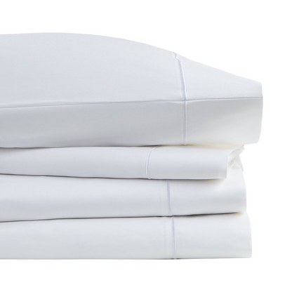 Start2Finish Pima cotton sheet set with smooth, white bedding, featuring a neatly made bed with matching pillowcases and crisp linens.