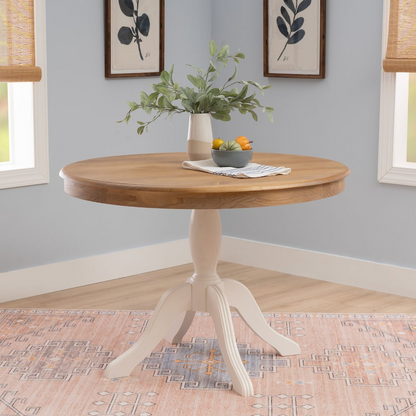 Start2Finish Tobin Pedestal Dining Table in natural wood and white finish, showcasing the smooth round tabletop and sturdy pedestal base.
