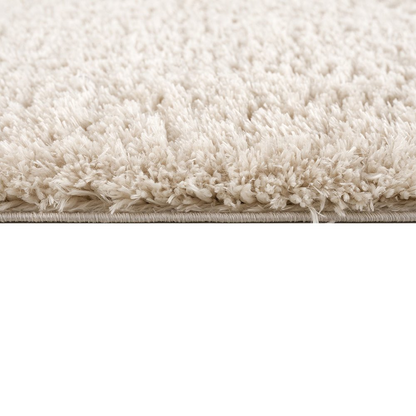Super soft polyester shag area rug by Start2Finish with plush, textured surface in neutral tones, perfect for cozy living spaces.