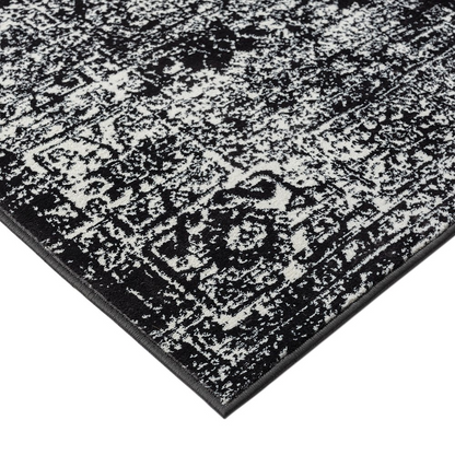 Distressed vintage Persian woven area rug with intricate patterns and muted colors, showcasing a distressed, aged look.