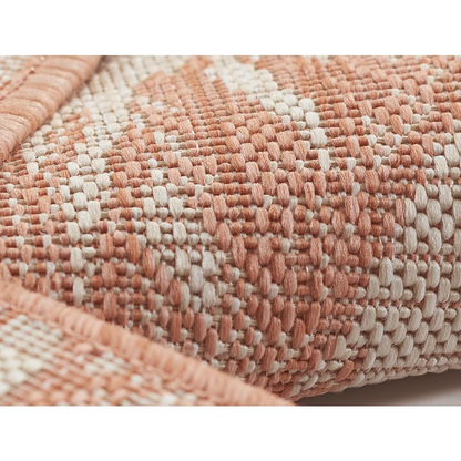Start2Finish transitional rectangle area rug in coral with geometric patterns, measuring 6&