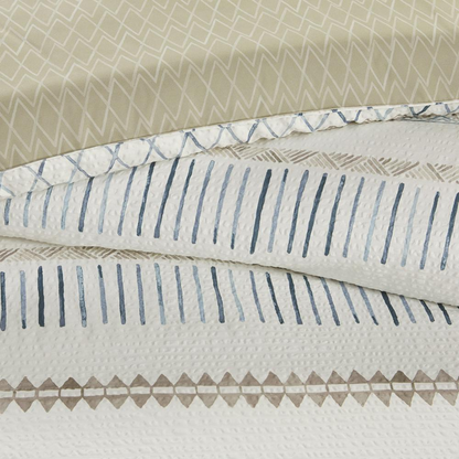 Start2Finish 5-piece printed seersucker bedding comforter set with matching throw pillows, showing colorful fabric patterns and textures.
