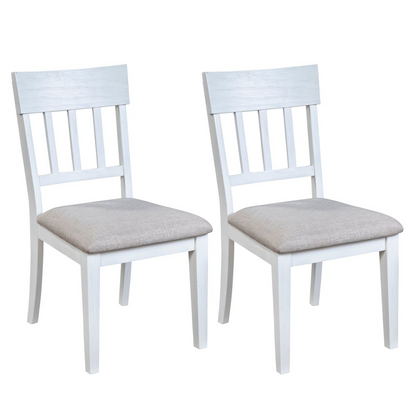 Pair of white Donham side chairs from Start2Finish, featuring a sleek, modern furniture design with wooden legs and comfortable seats.