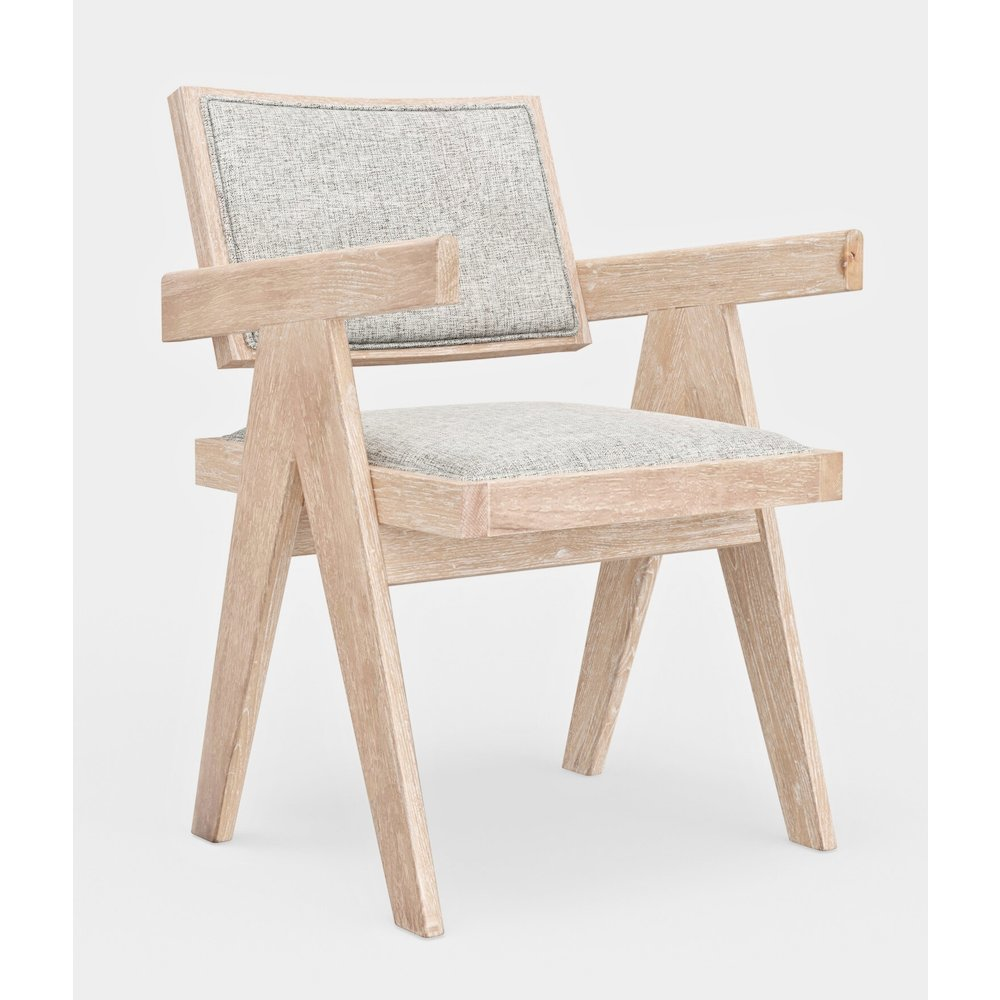 Set of two Raquel Side Chairs by Start2Finish with wooden legs and upholstered seats, shown in a modern dining room setting.