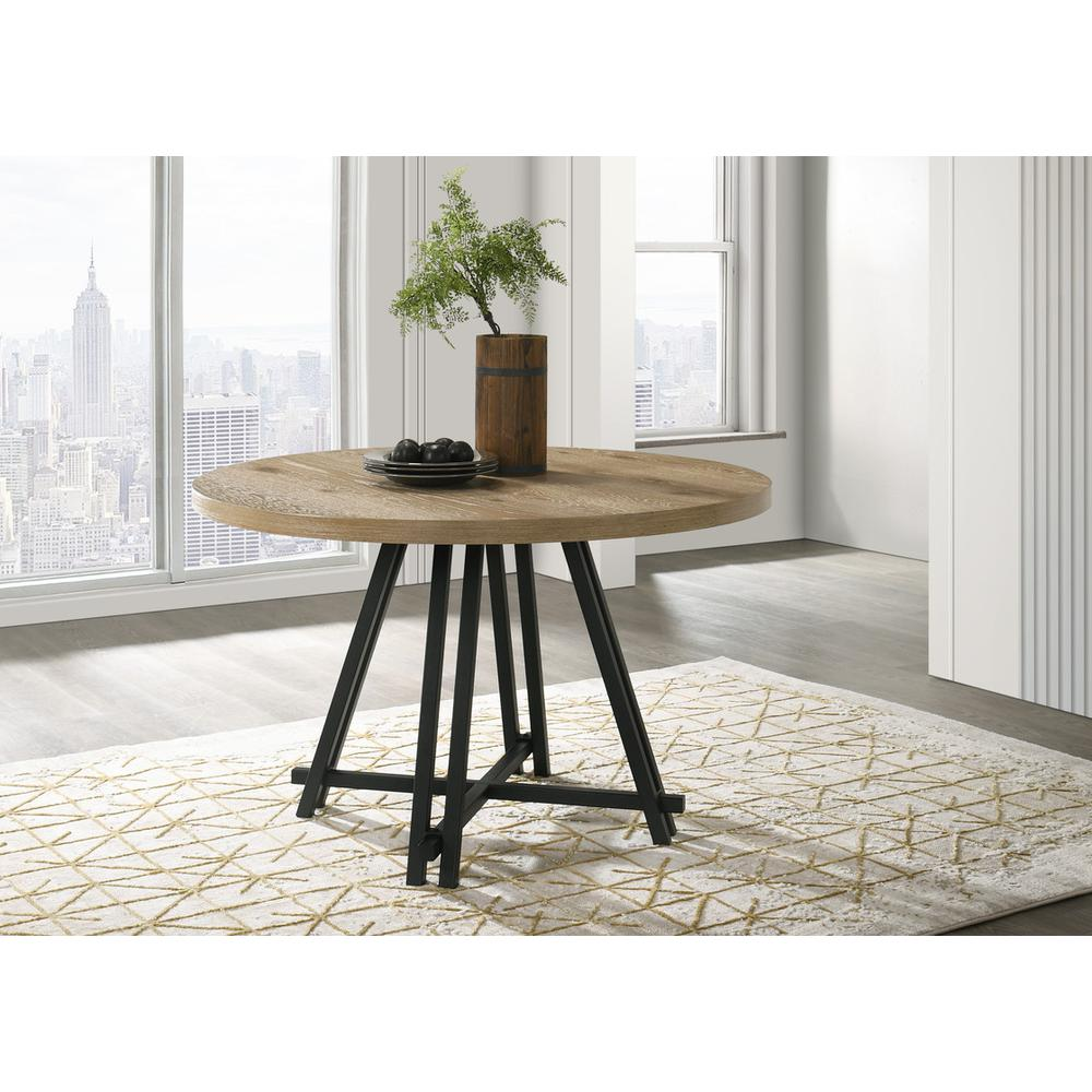 Round oak finish dining table with a metal base, 47 inches in diameter, by Start2Finish.