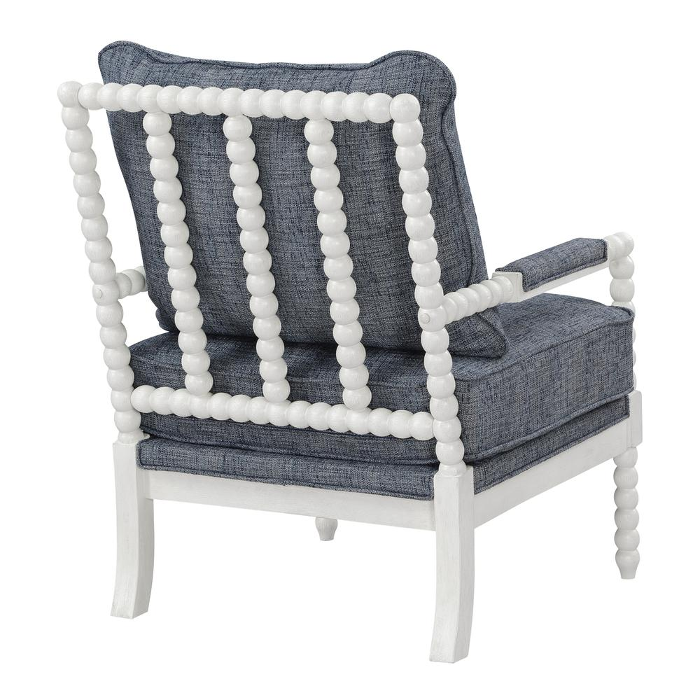 Start2Finish Kaylee Spindle Chair with wooden spindle legs and plush fabric upholstery, shown in a cozy living room setting.