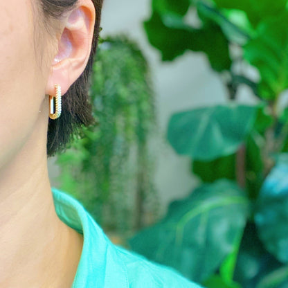 Fuchsia Hercules So Chic hoop earrings with a sleek gold finish, showcasing stylish jewelry for everyday wear.