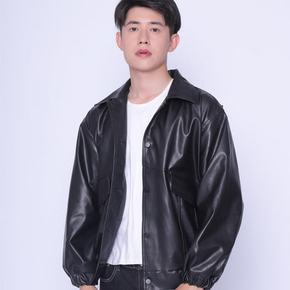 Black Drive Moto Jacket by Carmine Juneberry, Haute Edition 25, showing a stylish leather motorcycle jacket with silver hardware.