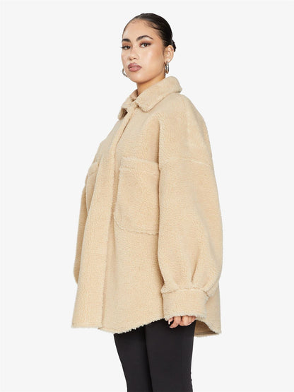 Rose Eleusis oversized patch pocket borg teddy shacket featuring a plush, textured exterior and large patch pockets.