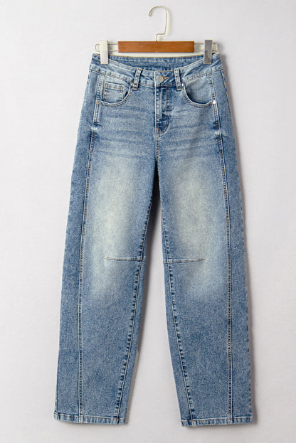 Vintage washed denim shift jeans for women by Byzantium Bay, showing the classic fit and faded blue fabric.
