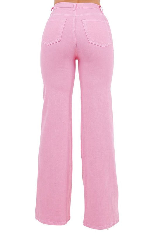 Jade Icarus Rodeo Wide Leg Pink Jeans displayed on a model, showcasing the relaxed fit and vibrant color.