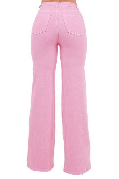 Jade Icarus Rodeo Wide Leg Pink Jeans displayed on a model, showcasing the relaxed fit and vibrant color.