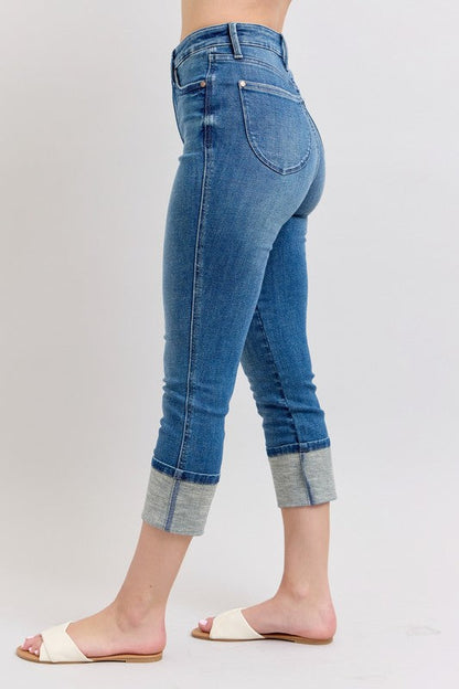 Judy Blue full size skinny cuff capris jeans with pockets, plus size women’s clothing by Jade Icarus, showing the denim fit and design.