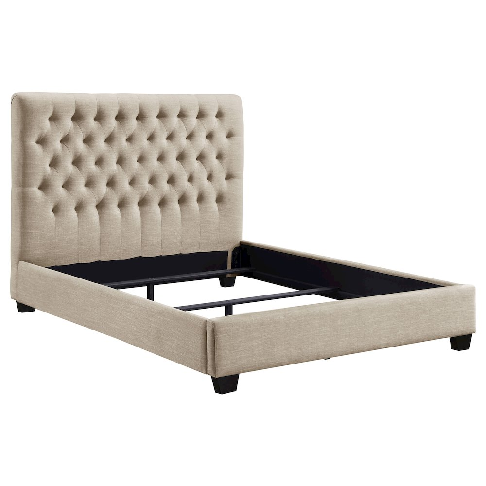 Chloe upholstered queen panel bed in oatmeal fabric with a padded headboard and wooden frame, styled in a modern bedroom setting.