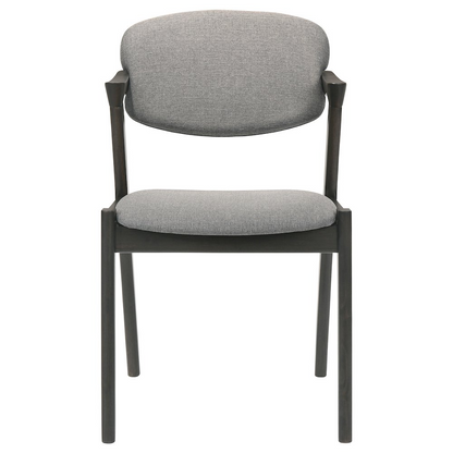 Set of two black Stevie padded wood dining arm chairs with cushioned seats and armrests, stylish and modern for dining rooms.