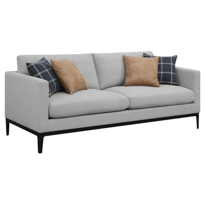 Light grey upholstered Apperson track arm sofa by Start2Finish with plush cushions and modern design, shown in a living room setting.