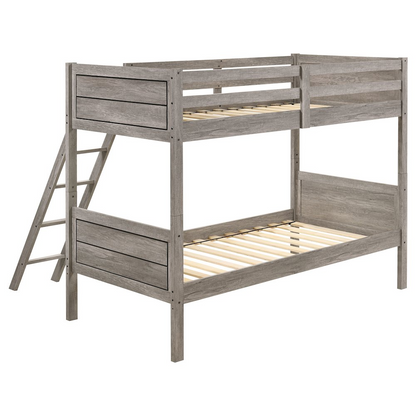 Weathered taupe Ryder Wood twin over twin bunk bed by Start2Finish with sturdy frame and classic design, shown in a well-lit bedroom.