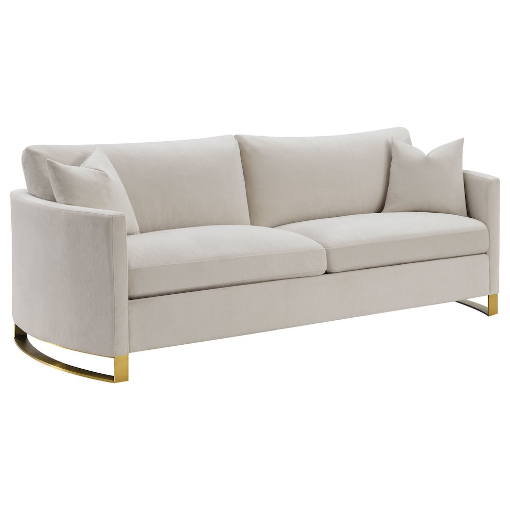 Start2Finish Corliss upholstered arched arm sofa in beige, featuring plush cushions and stylish tapered wooden legs.