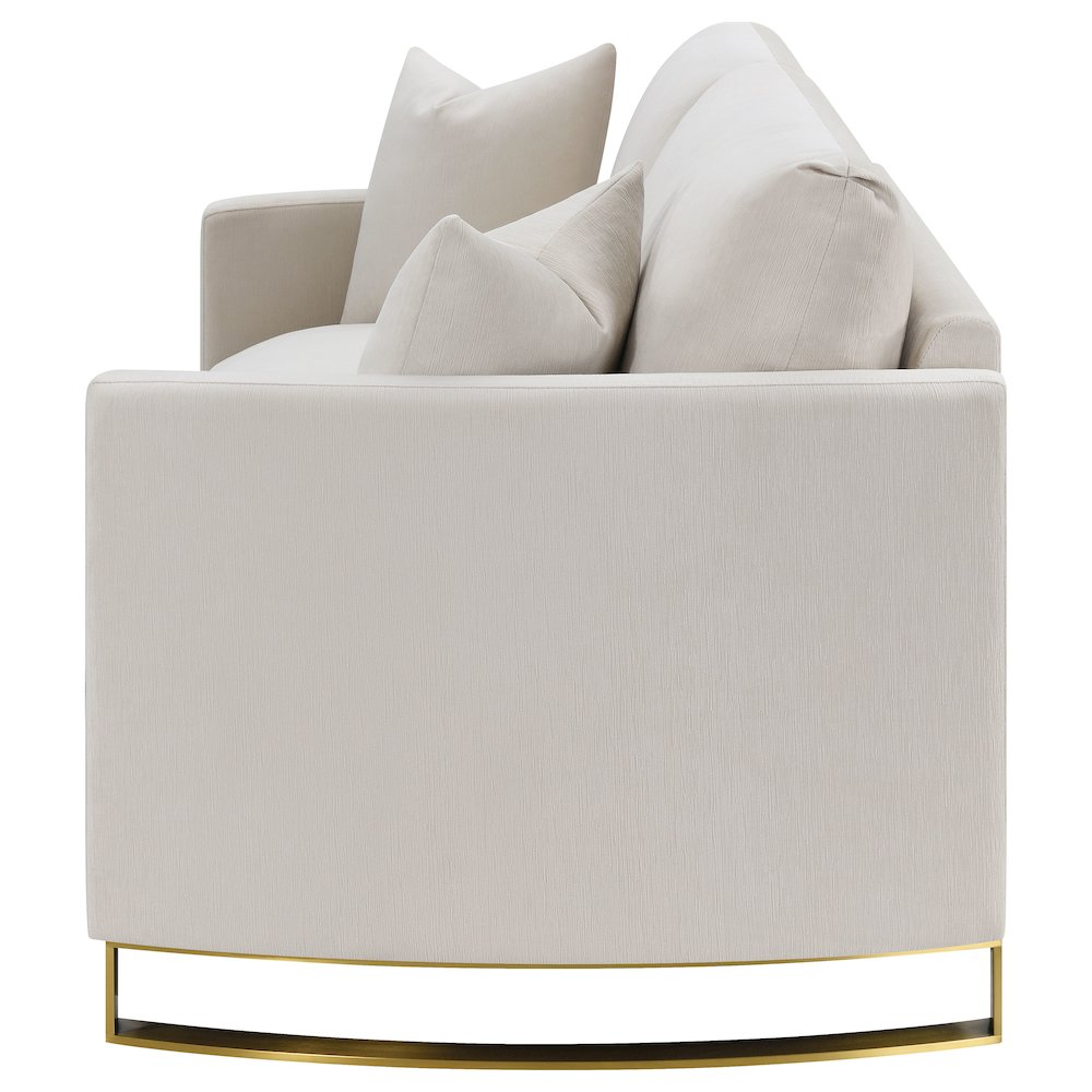 Corliss beige upholstered arched arm loveseat by Start2Finish, showcasing plush fabric and elegant design in a home furniture setting.