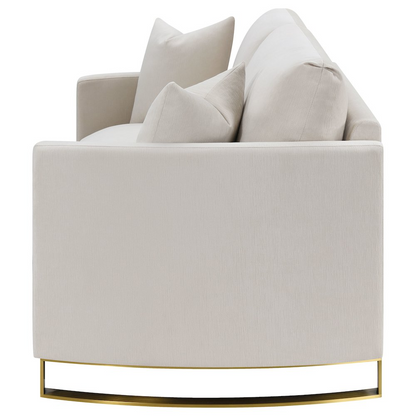 Corliss beige upholstered arched arm loveseat by Start2Finish, showcasing plush fabric and elegant design in a home furniture setting.