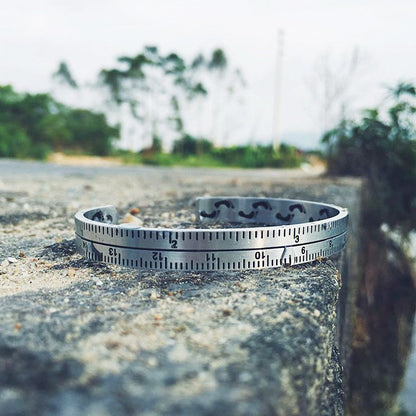 Fuchsia Molly ruler bracelet with silver-tone metal and engraved measurements, displayed on a white background.